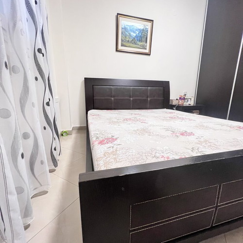 Double bed with mattress made of real wood, used
