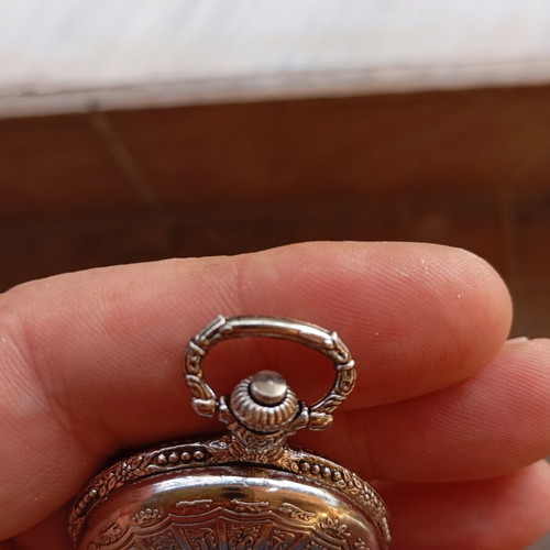 Dhalya pocket watch like new with intricate designs and new battery