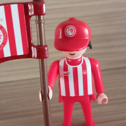 Playmobil Olympiacos fan figure with team flag, like new