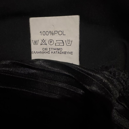 Iso black blouse size S like new with asymmetric hem and pleats