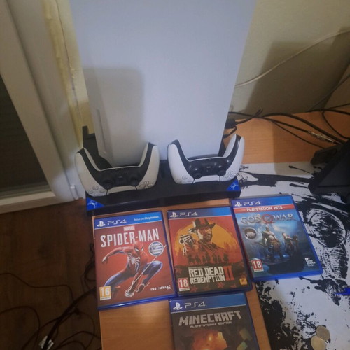 PS5 825GB Disc Edition with 2 controllers and charging cooling stand