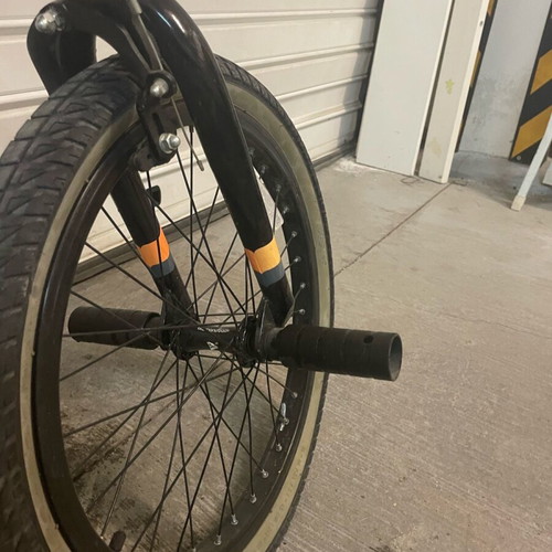 BMX bicycle like new, black, with extra metal pegs for tricks