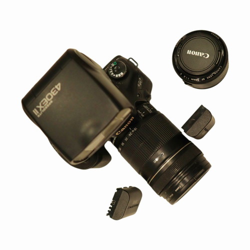 Canon EOS 7D like new with 18-55 and 18-135 lenses, flash, accessories