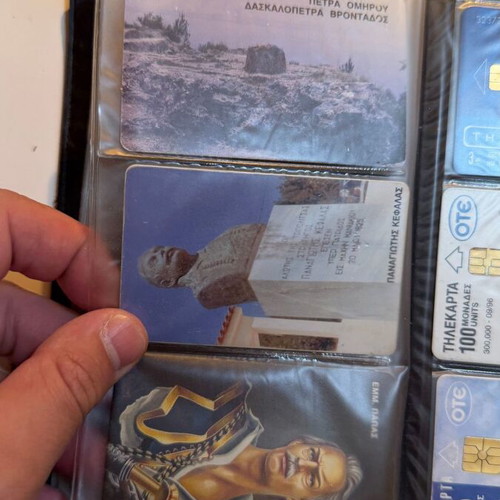Vintage OTE phone card collection in black album