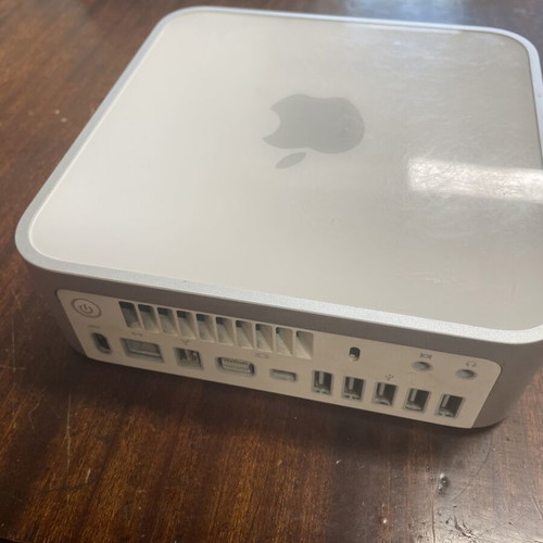 Mac mini 2009 with charger and monitor adapter