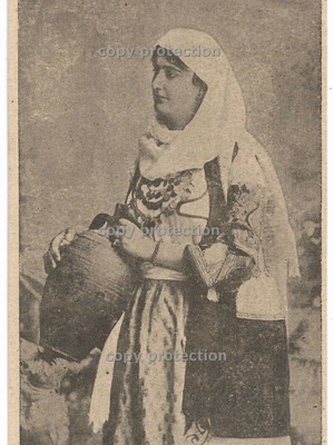 Postcard woman with traditional costume used, 1910s