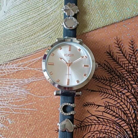 Loisir women's watch like new with black leather strap and rose gold details