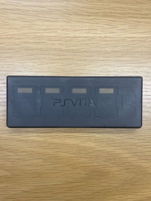 PS Vita PCH-1004 OLED като нов с 6 игри и калъфи Sony