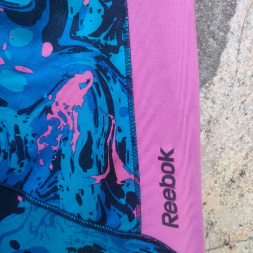 Reebok Play Dry sports leggings size S like new, blue and pink abstract