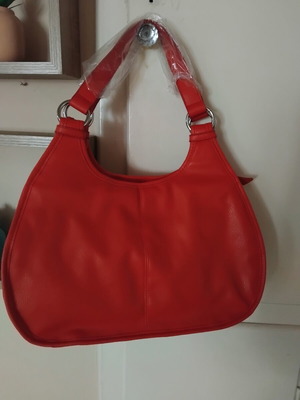 Red leather handbag new without defects