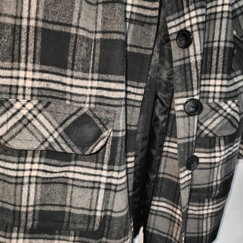 Checked coat with high collar, pockets and buttons