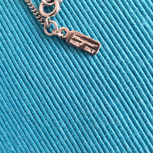 Salvatore Ferragamo authentic necklace like new with purple and silver crystals