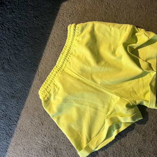 Yellow-green shorts with fluorescent drawstrings