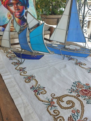 Set of sailboats like new made of steel and glass
