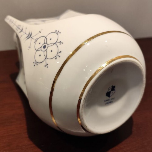 Limoges porcelain vase like new with blue decoration and gold details