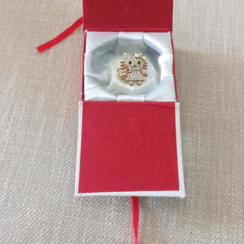 Hello Kitty pin new, gold color in box