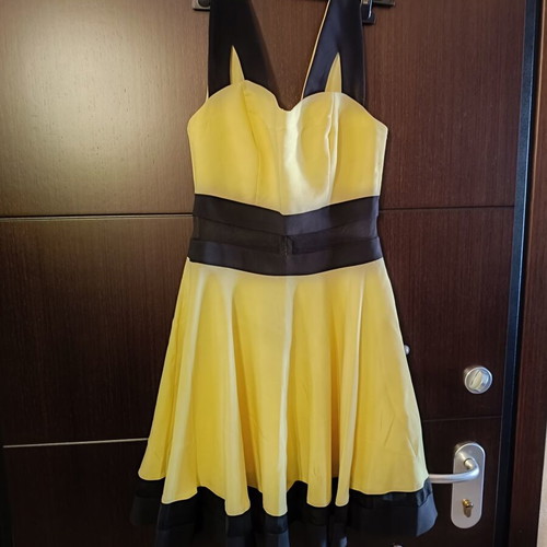 Cocktail dress with transparency at the waist like new, size M