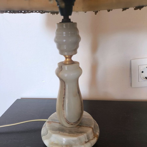 Vintage table lamp with embroidered fabric shade used