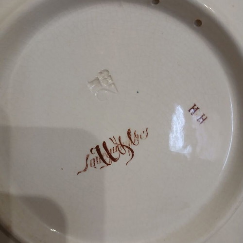 Set of 2 used Sarreguemines decorative plates with portraits of Nicholas II and Alexandra