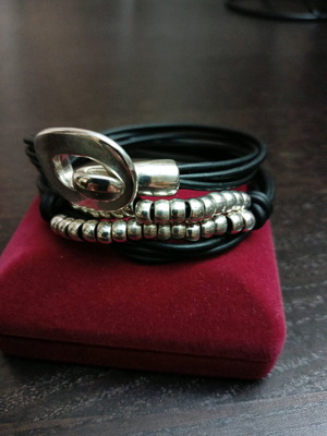 Bracelet with leather and metal elements like new, black and silver