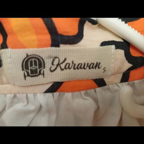 Karavan set with skirt and plain bodysuit, colorful orange