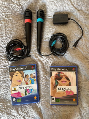 Singstar set with two microphones and two games like new for PlayStation 2