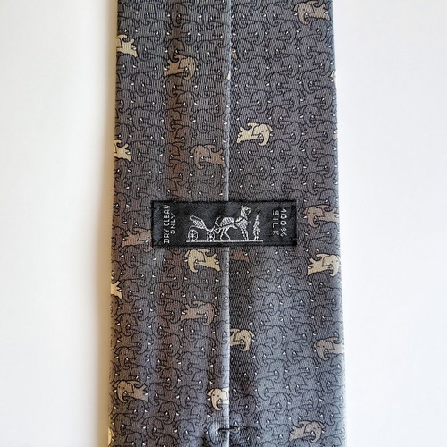 Hermes silk tie with elephant pattern, like new, gray beige
