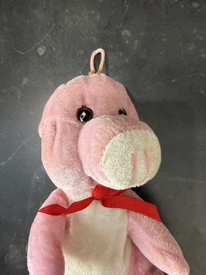 Plush pig with red bow
