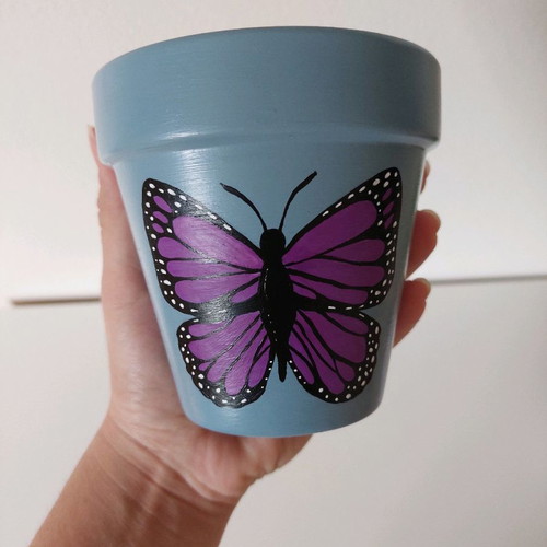 Hand-painted clay flowerpot new with butterfly design