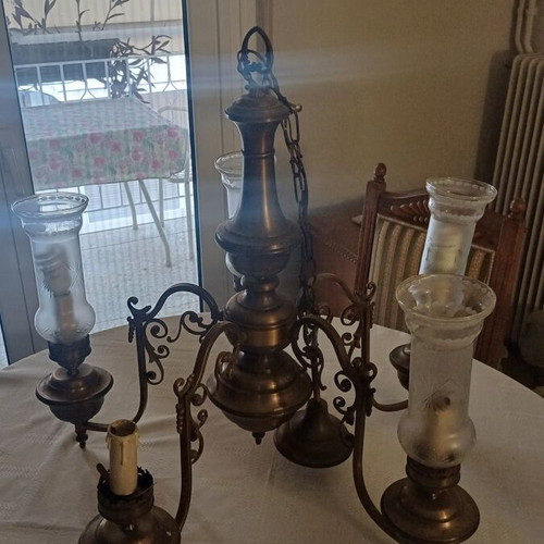 Antique chandeliers used, two pieces with missing crystal covers