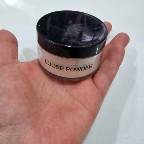 Radiant loose powder n.09 nearly full, like new