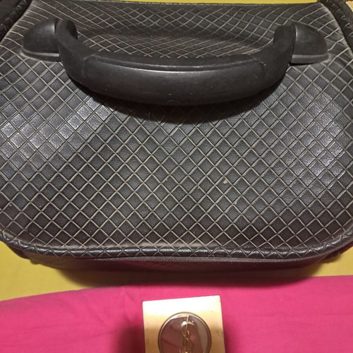 Large collection of branded cosmetics with YSL mirror and makeup bag