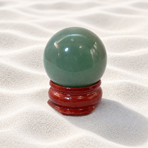 Decorative desk sphere with rosewood base and aventurine stone