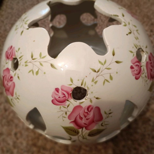 Ceramic lamp shade used with decorative design