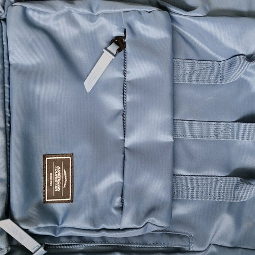 American Tourister blue backpack like new with pockets