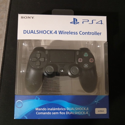 Sony DualShock 4 PS4 Jet Black wireless controller with box and manual