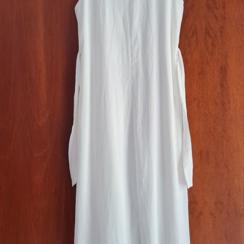 Doca dress new, white, fits small and medium sizes