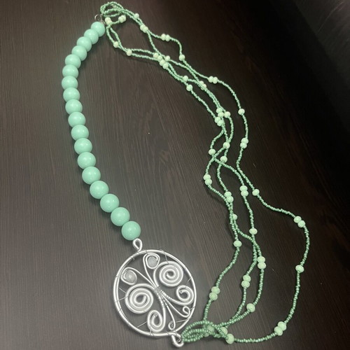 Handmade necklace with wire and beads, turquoise