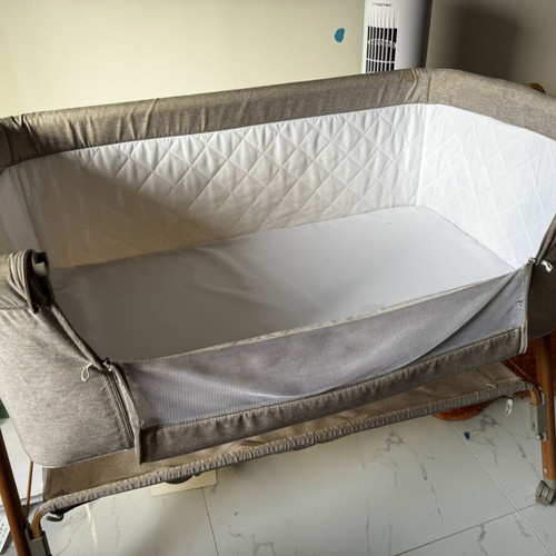 Chipolino Sweet Dreams bedside crib used with mattress and wheels