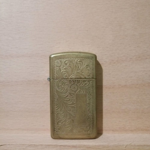 Zippo brass lighter used with engraved design