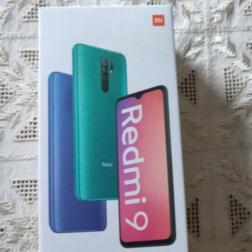 Redmi Note 9 box with manuals