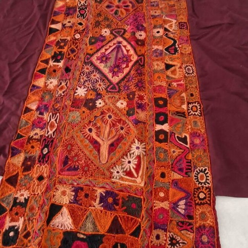 Handmade woven cover like new in red shades