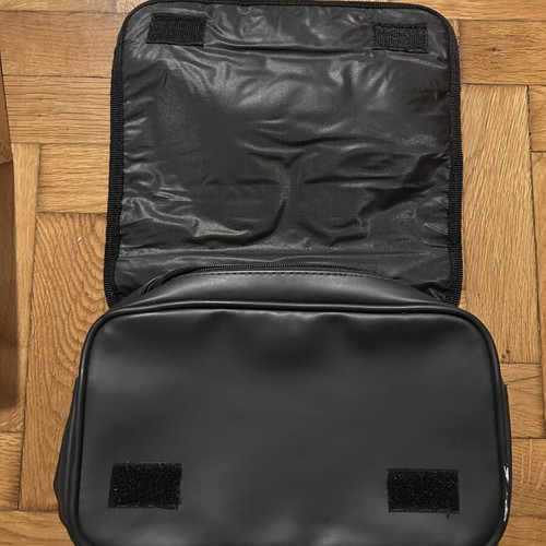 Two black leather toiletry bags, one Adidas