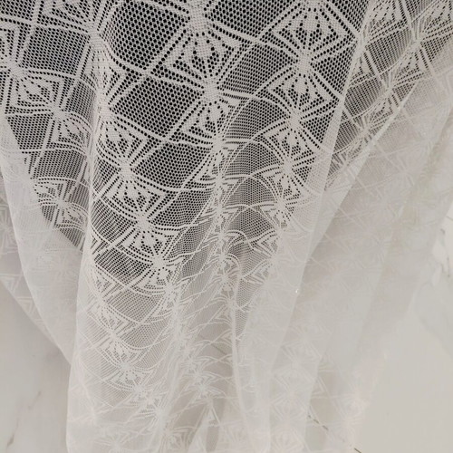 Two sewn white lace curtains, 2.5m height, 1.5m width each