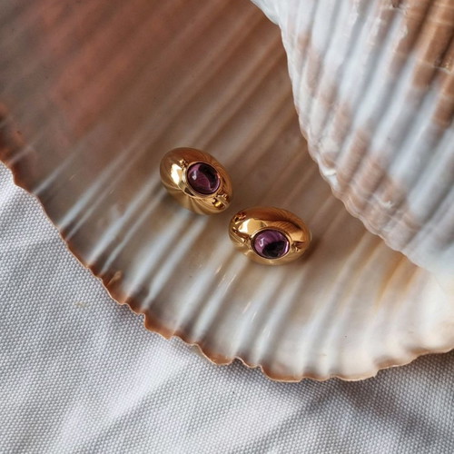 Vintage earrings used with purple stone