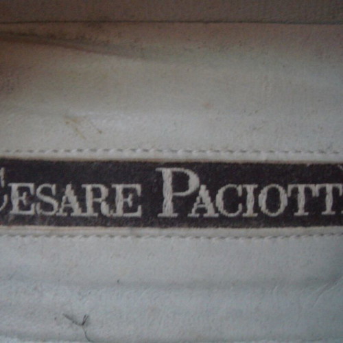 Cesare Paciotti black leather pumps used with chain detail