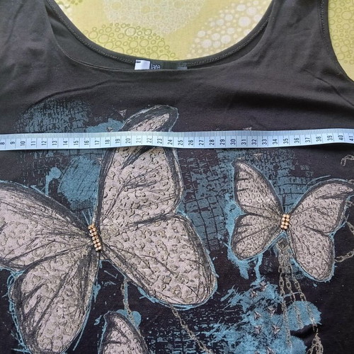 Derpouli Late Edition black top with butterflies like new