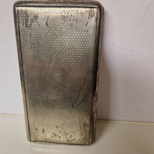 Cigarette case used, silver with slight wear