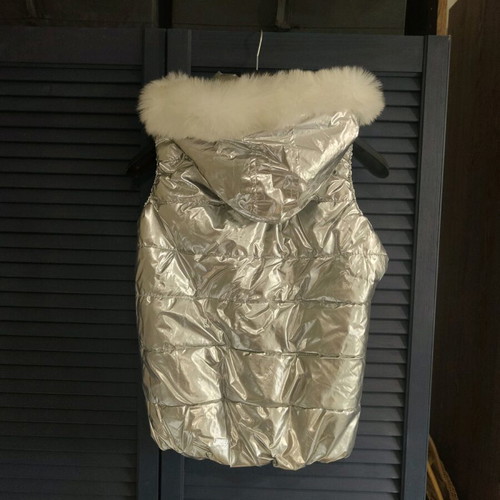Silver sleeveless jacket used for girls aged 9-11 years