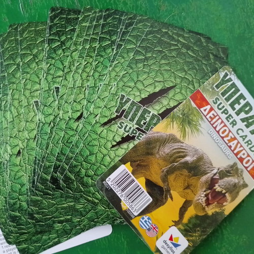 Yperatou card games used, cats and dinosaurs